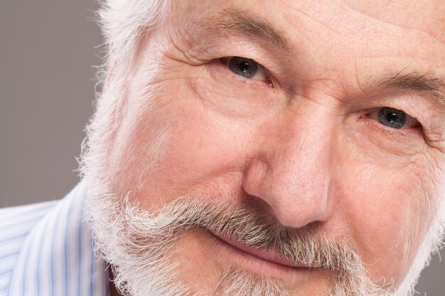 Handsome elderly man with grey beard