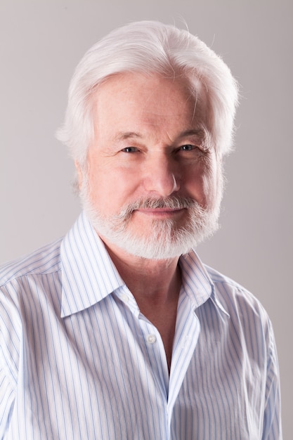 Handsome elderly man with grey beard