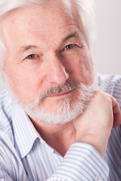 Handsome elderly man with grey beard