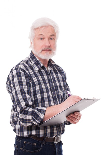 Handsome elderly man writing