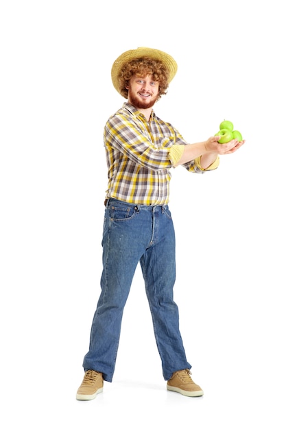 Free photo handsome farmer, rancher isolated over white studio