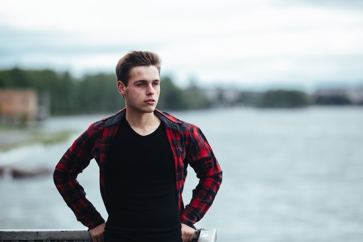 Free Photo handsome guy posing outdoors