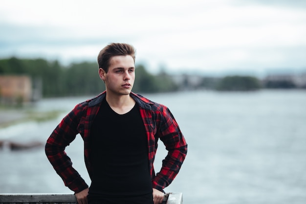 Handsome guy posing outdoors