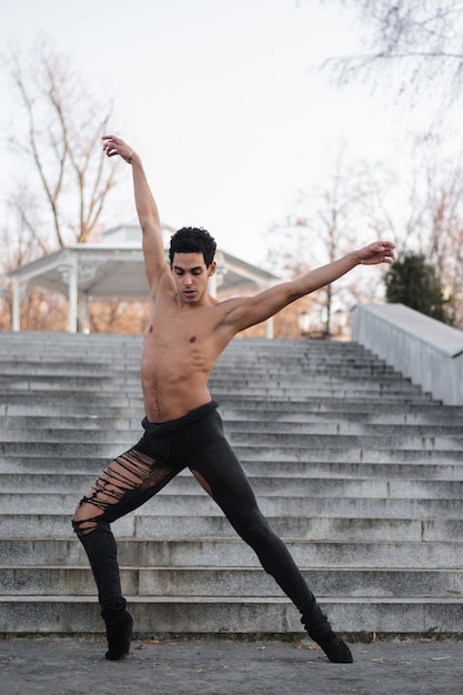 Free photo handsome male dancing ballet