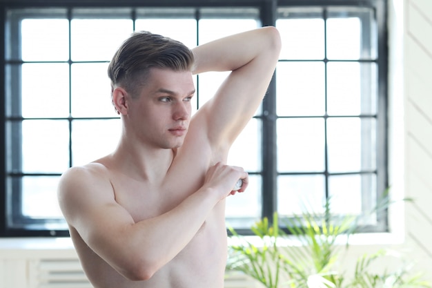 Muscular Man Having A Shower, Wearing Only Underwear Stock Photo, Picture  and Royalty Free Image. Image 24285578.