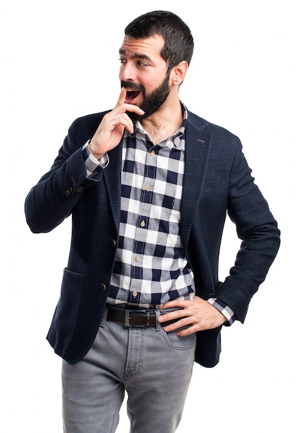 Handsome man doing surprise gesture