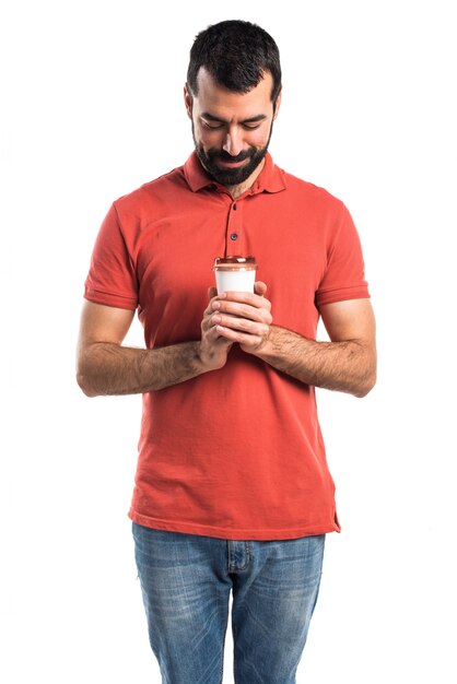 Handsome man drinking coffee