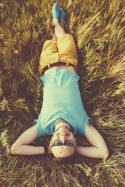 Free photo handsome man enjoying outdoors. retro vintage instagram filter