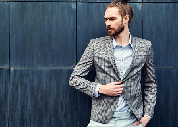 Handsome man in gray checkered suit