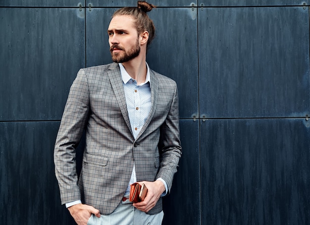 Handsome man in gray checkered suit