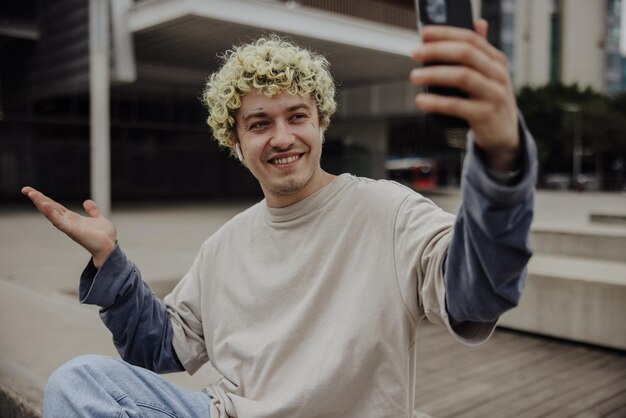 Handsome man holding a phone