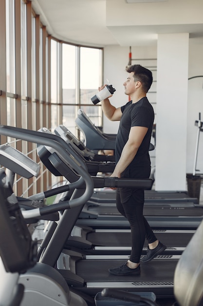 A handsome man is engaged in a gym