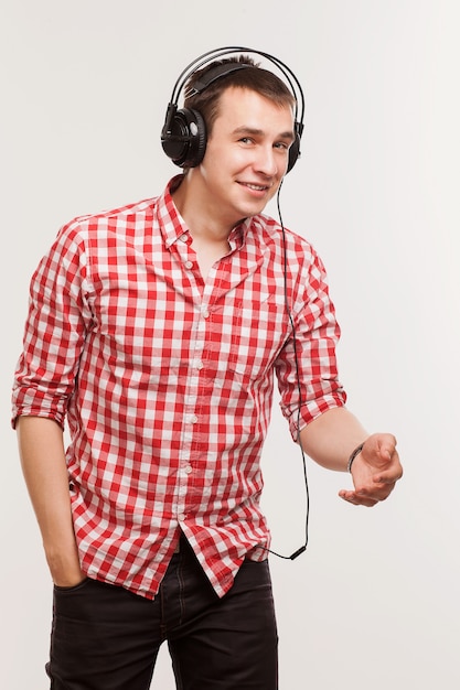 Handsome man listening to music