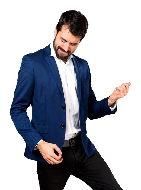 Free photo handsome man making guitar gesture