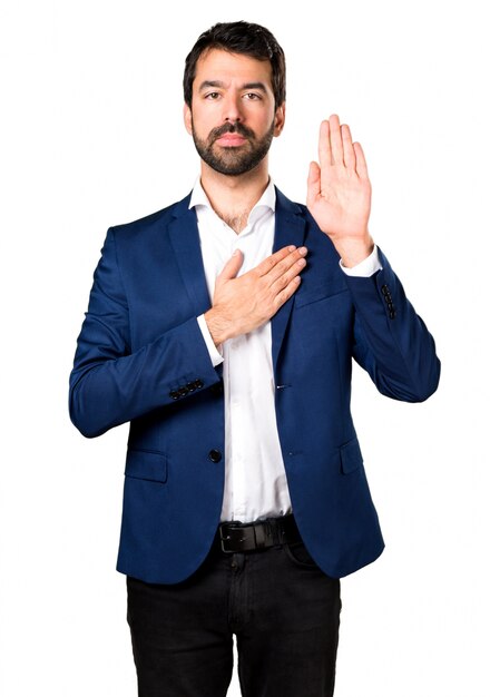 Handsome man making an oath