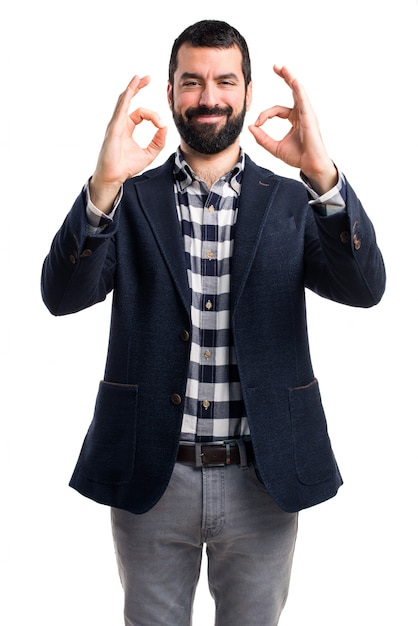 Free photo handsome man making ok sign