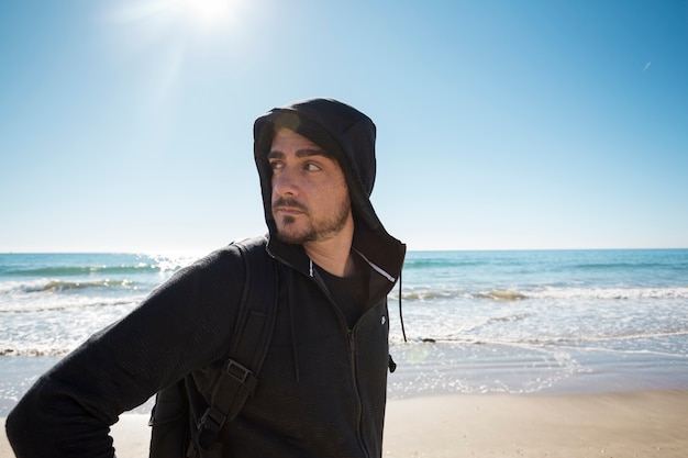 Handsome man near sea