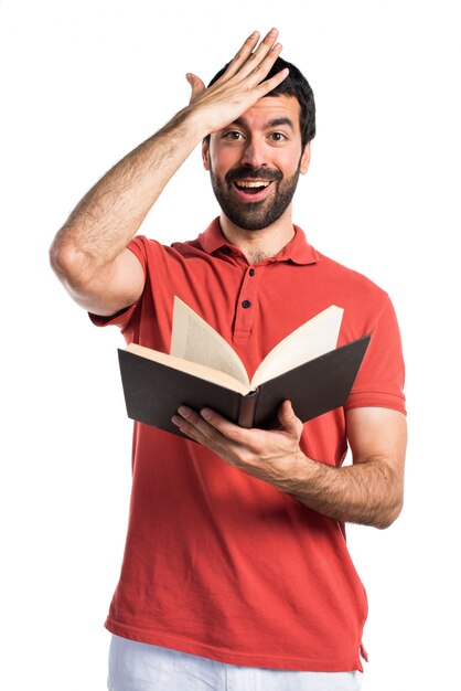 Handsome man reading book