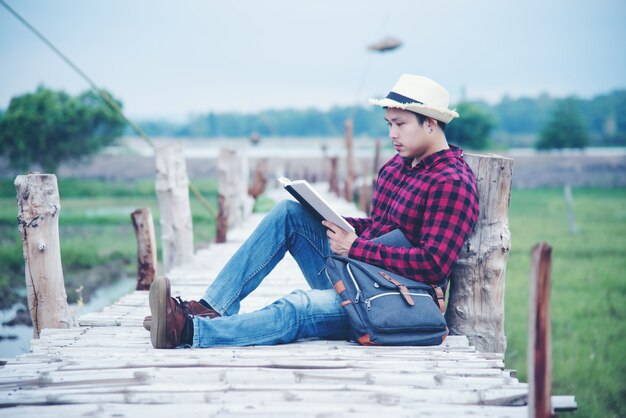 Handsome man relax in the travel nature