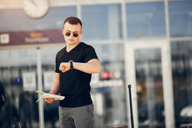 Handsome man standing in airport