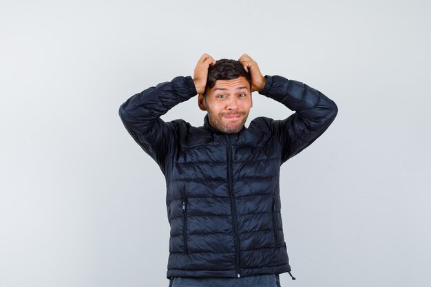 Handsome man wearing a bomber jacket