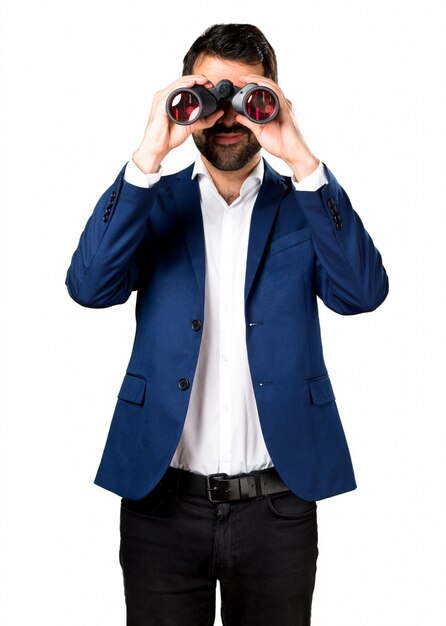 Handsome man with binoculars