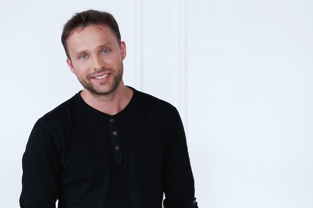 Handsome man with black t-shirt posing