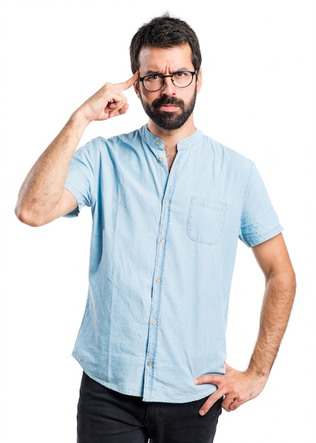 Handsome man with glasses thinking