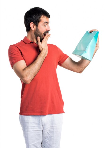 Handsome man with shopping bag