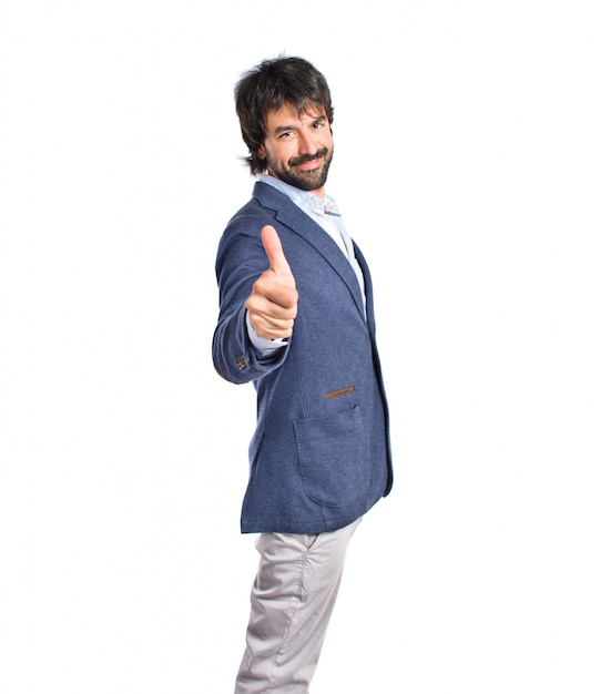 Free photo handsome man with thumb up over white background