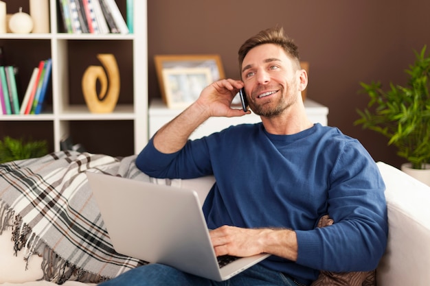 Handsome man working at home 
