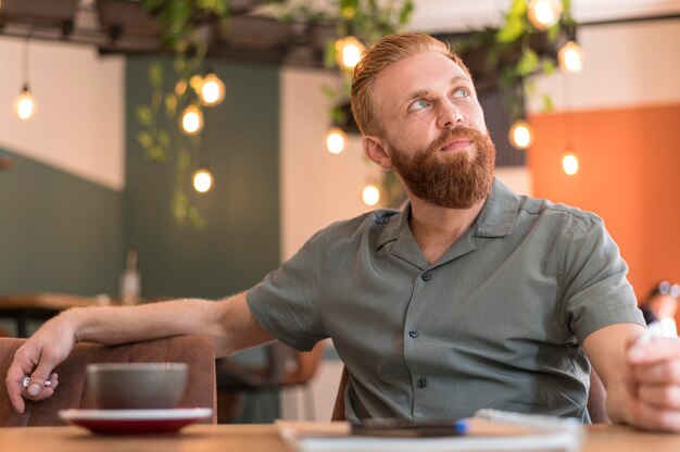 Handsome modern man sitting