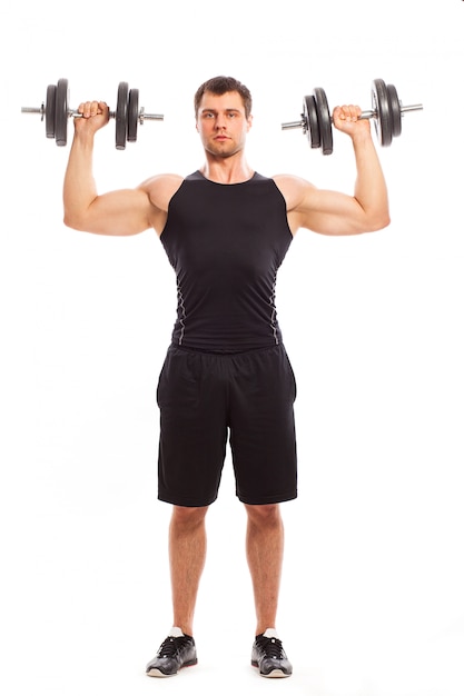 Handsome muscular guy working out 