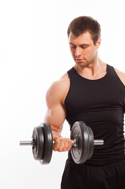 Handsome muscular guy working out 