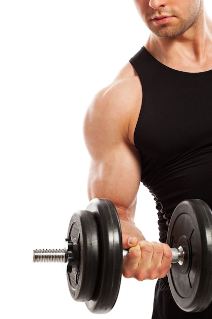 Handsome muscular guy working out 