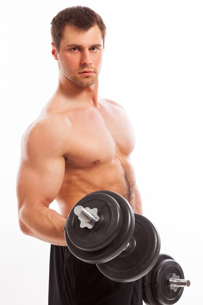 Handsome muscular guy working out 