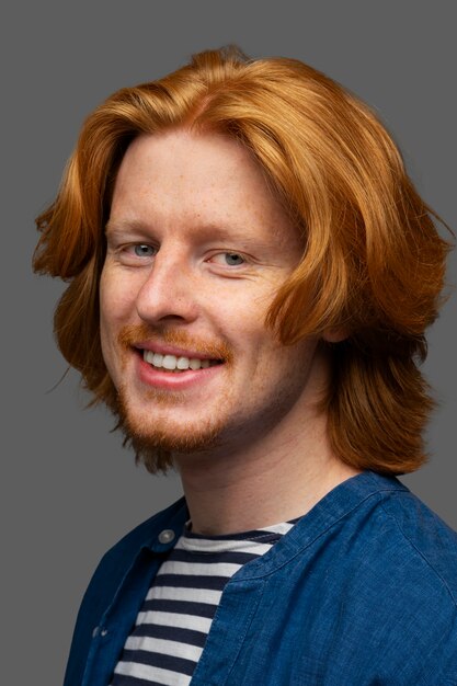 Handsome and sensitive red head man smiling