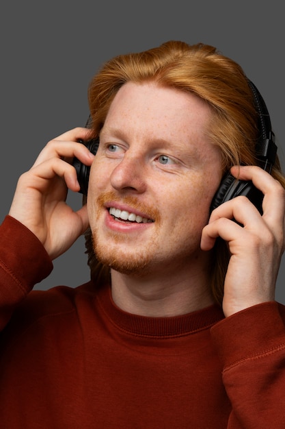 Handsome and sensitive red head man smiling