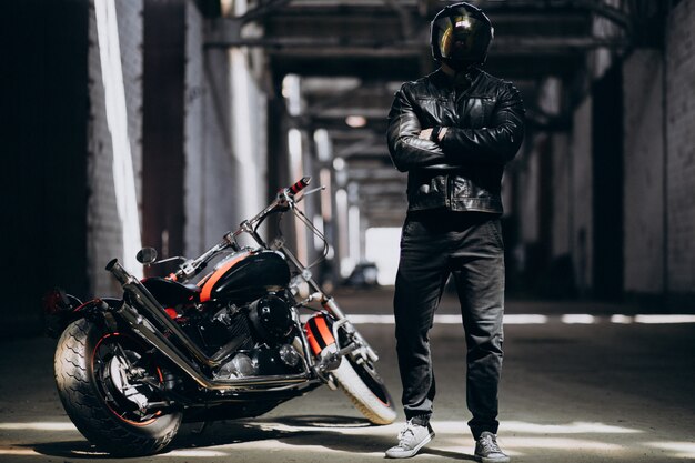 Handsome sexy man on motorbike