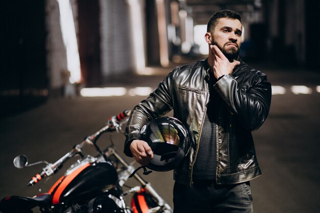 Handsome sexy man on motorbike