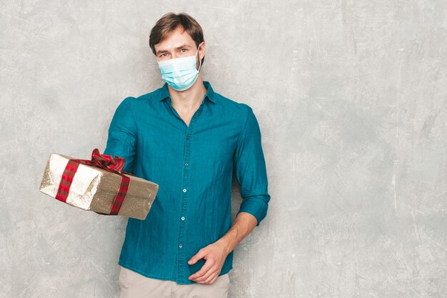 Handsome smiling hipster lumbersexual businessman model wearing casual jeans shirt clothes. 