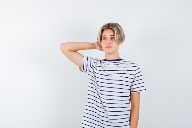 Handsome teen boy in a striped t-shirt