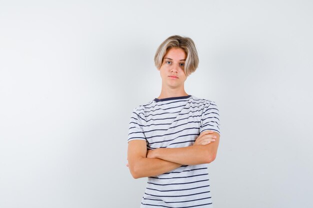 Free photo handsome teen boy in a striped t-shirt