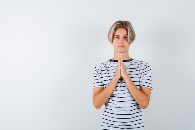 Free photo handsome teen boy in a striped t-shirt