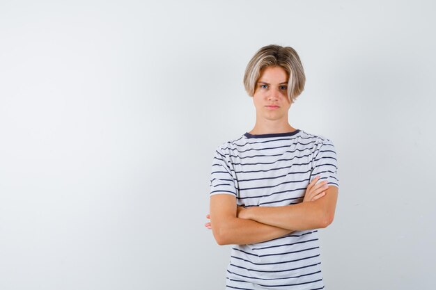 Handsome teen boy in a striped t-shirt