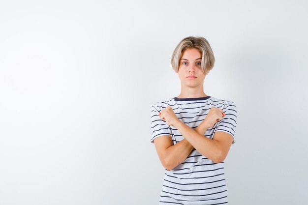 Handsome teen boy in a striped t-shirt