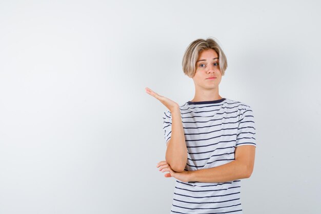 Handsome teen boy in a striped t-shirt