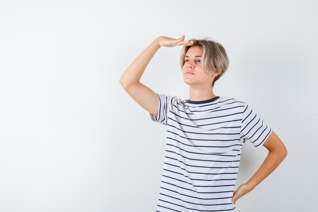 Handsome teen boy in a striped t-shirt