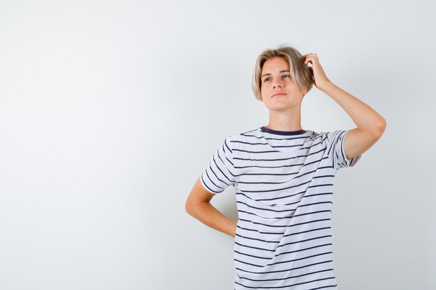 Handsome teen boy in a striped t-shirt