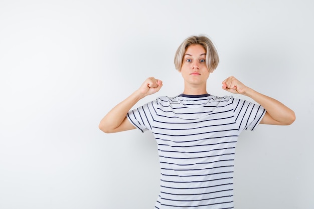 Handsome teen boy in a striped t-shirt